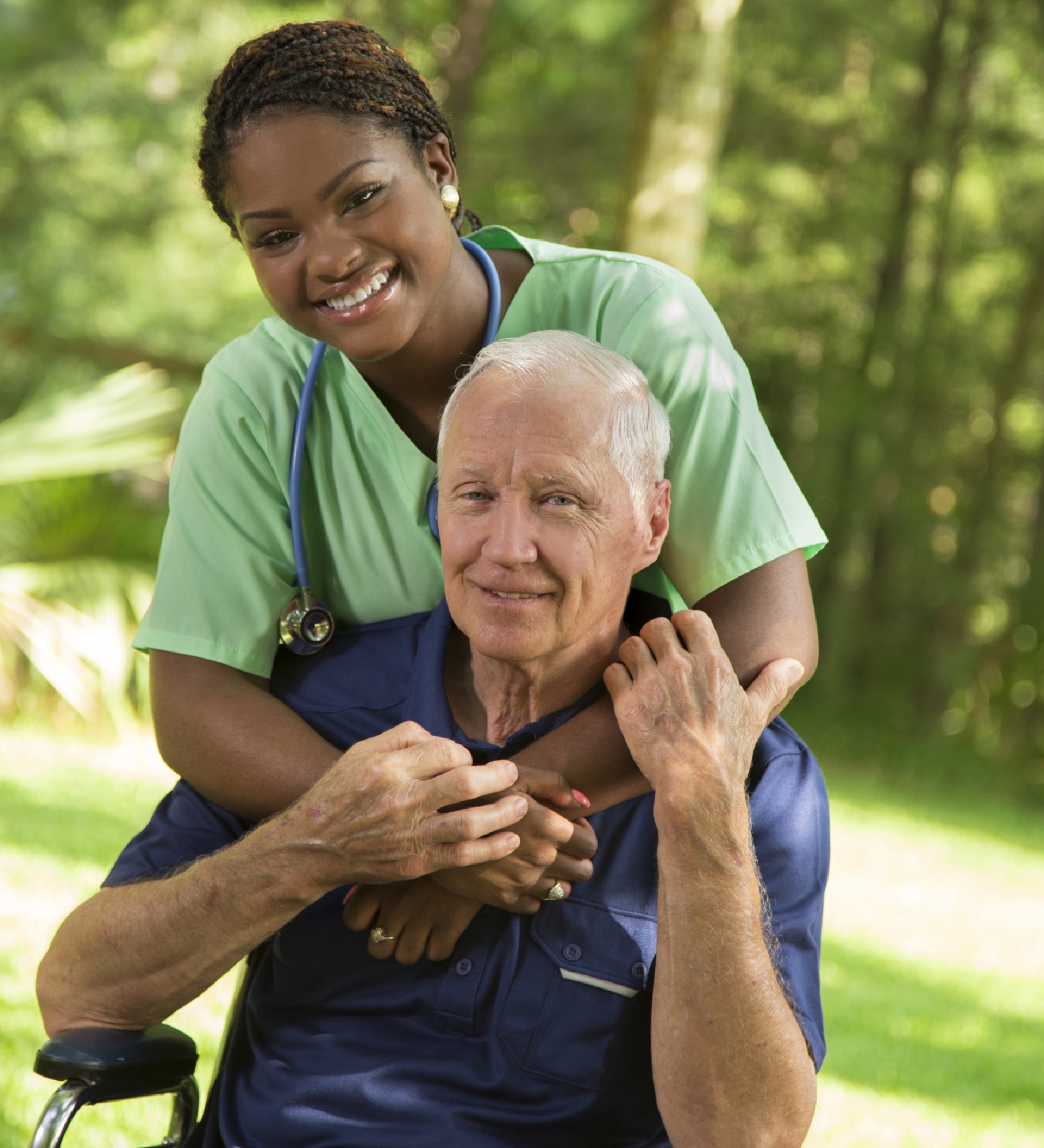 Photo: Senior man receiving hug from healthcare worker